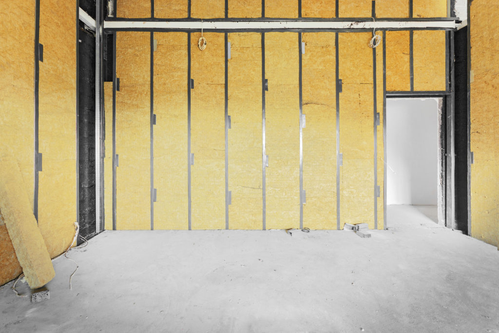 Insulation installed in the walls of a commercial room